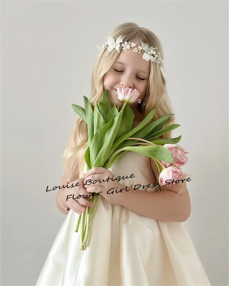 Booma ألف خط زهرة فتاة فساتين القوس الساتان بنات فساتين حفلات الزفاف السباغيتي حزام بلا أكمام فساتين مخصصة