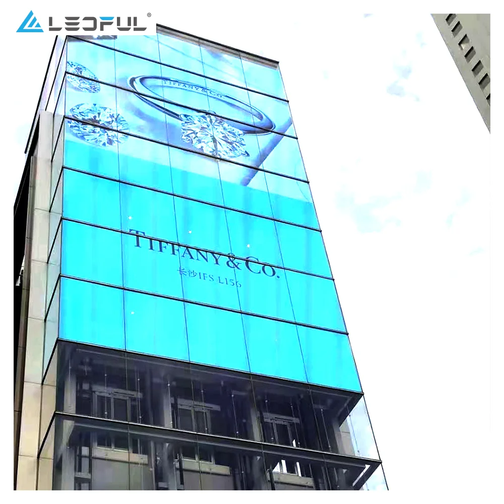 Pantalla de visualización LED transparente de malla LED de vidrio de pared de vídeo a todo color SMD P3.9-7.8 para interiores y exteriores de alto brillo