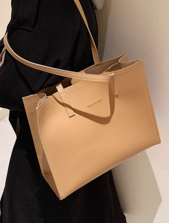 

Large capacity commuter tote bag fashionable and versatile hand-raised sense of leisure shoulder bag