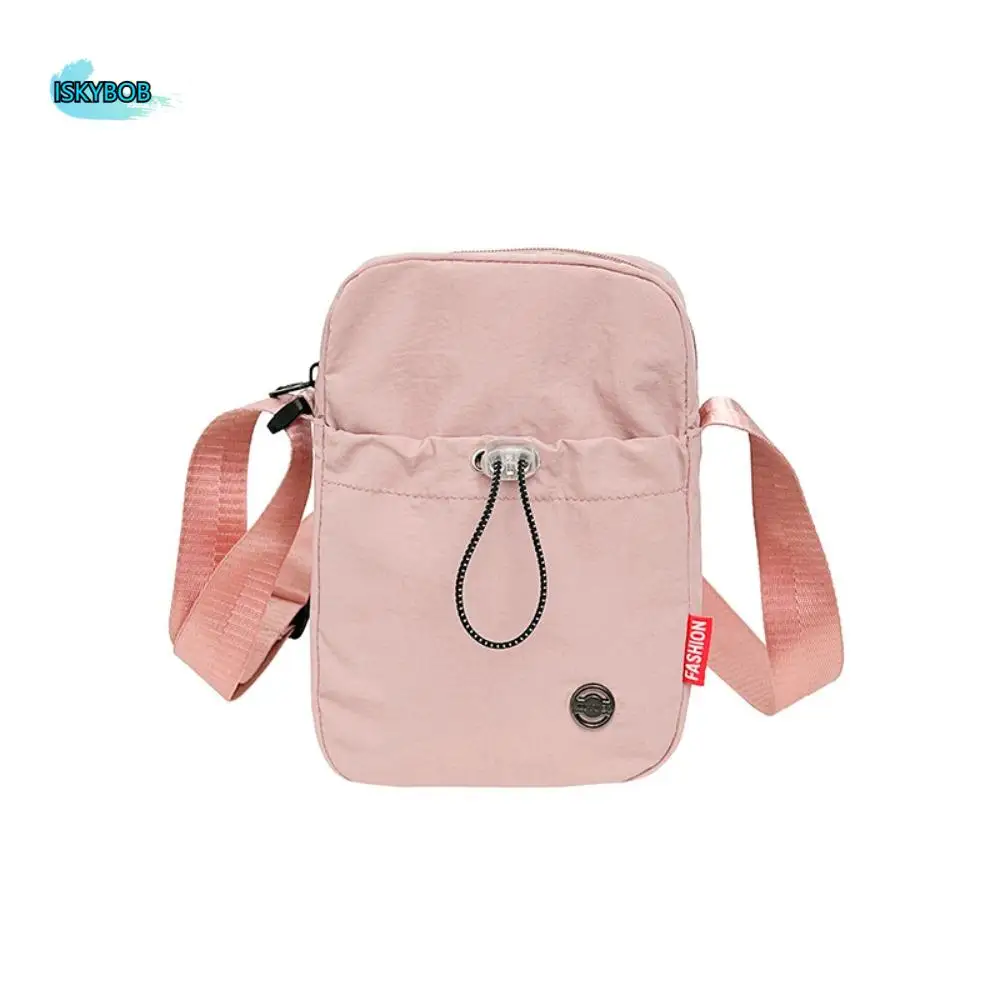 Torba crossbody ze sznurkiem, jednolity kolor, styl koreański, nylonowa torba na ramię, duża otwarta, wodoodporna torba na butelkę z wodą.