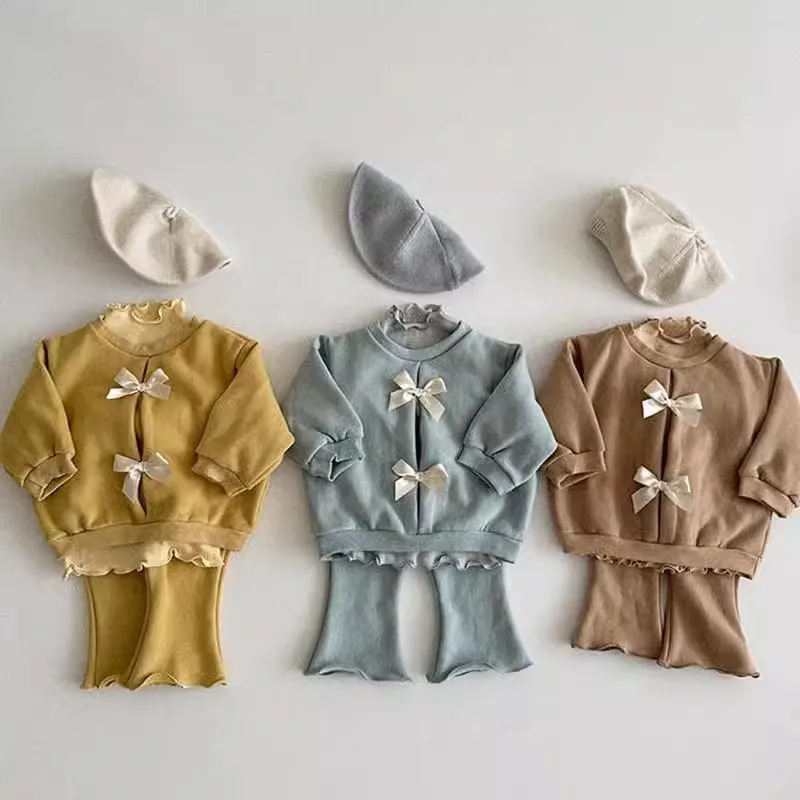 

2025 Korean Style Girls' Spring Autumn Outfit Girls Solid Bow Bottoming Tops + Flared Pants 2pcs SuitKids Cotton Sports Outfits