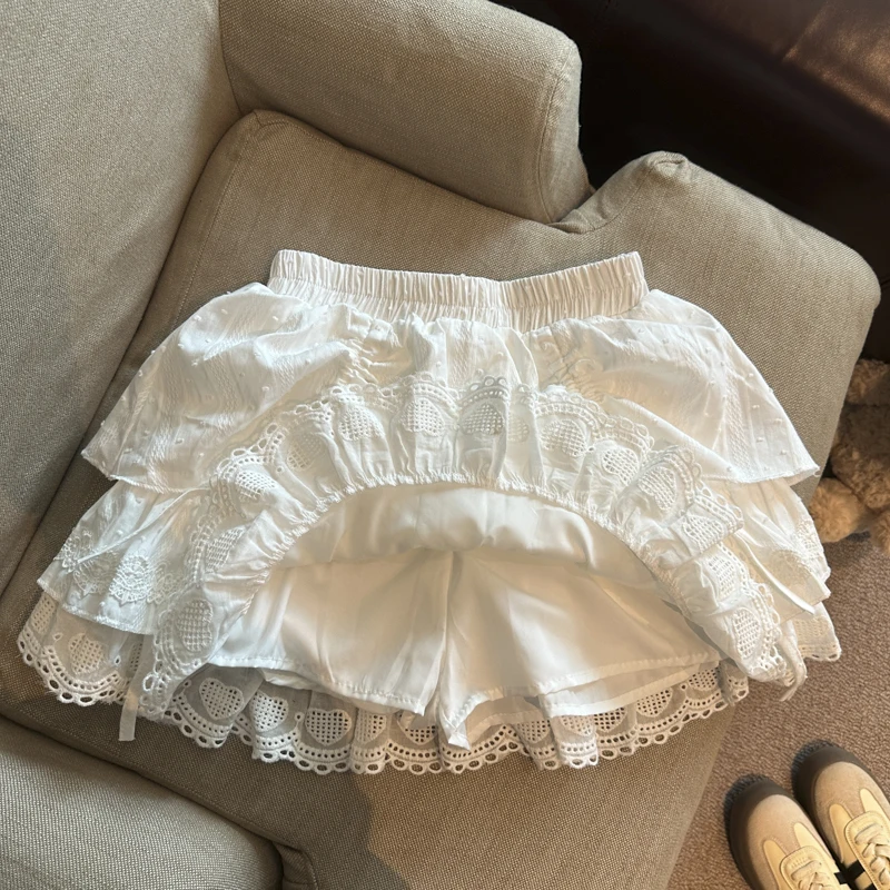 

Элегантная белая юбка с кружевной отделкой и вышивкой, с завышенной талией, А-силуэт, женская летняя модная утягивающая юбка средней длины