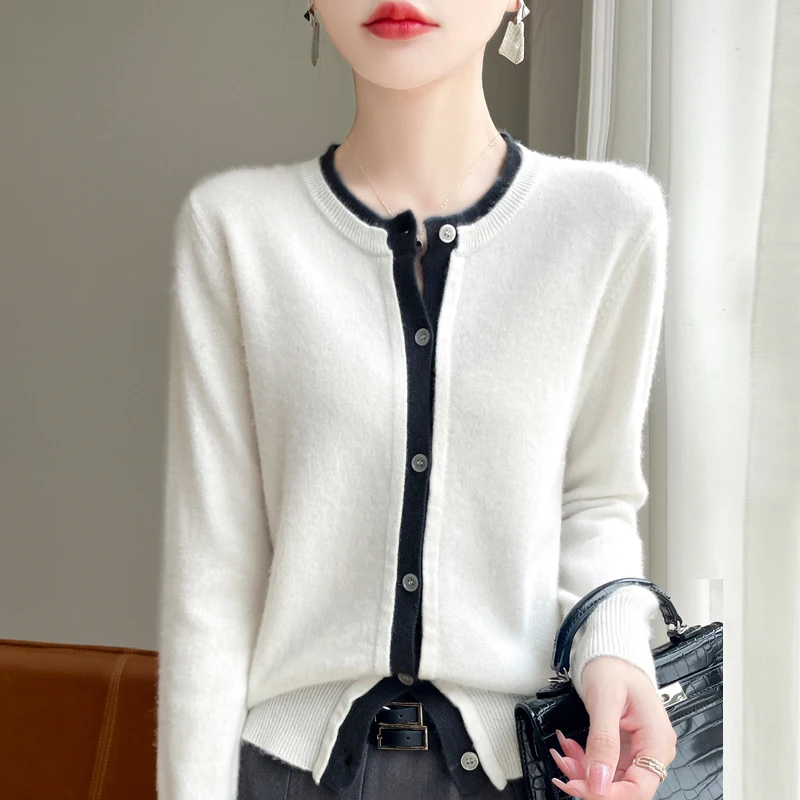 Autumn and winter new 100% pure sweater women's O-neck cardigan fake two loose casual contrast long-sleeved coat.