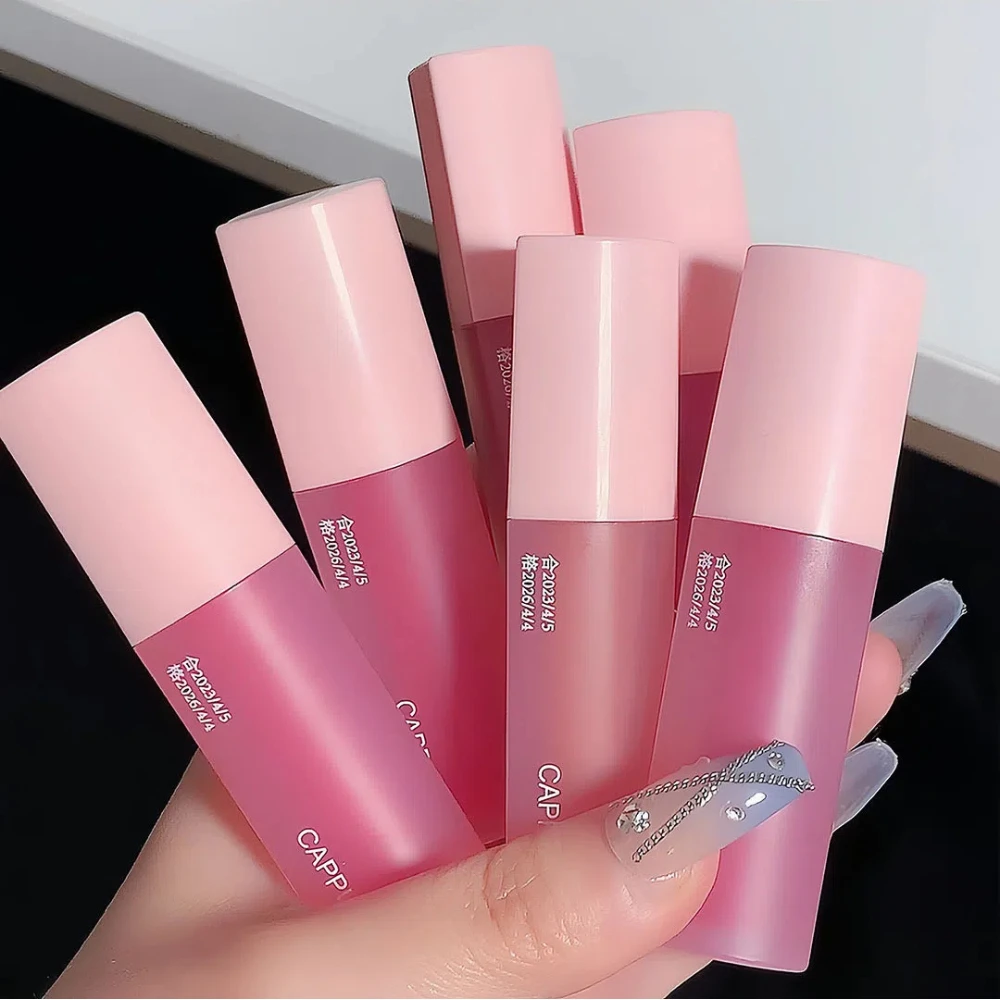 รูปหัวใจสีชมพู Lip Glaze Mirror ลิปสติกให้ความชุ่มชื้นยาวนานเงาเซ็กซี่ Lip Tint แก้วสีแดงหญิง Plumper แต่งหน้า