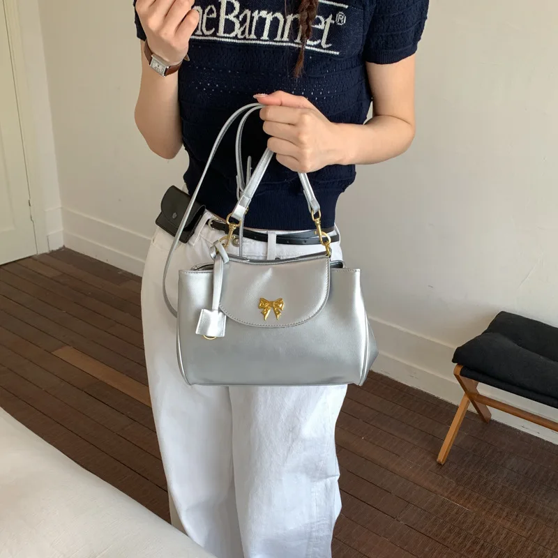 

Commuter bow tote bag 2026 new casual solid color shoulder bag fashion trendy messenger armpit bag