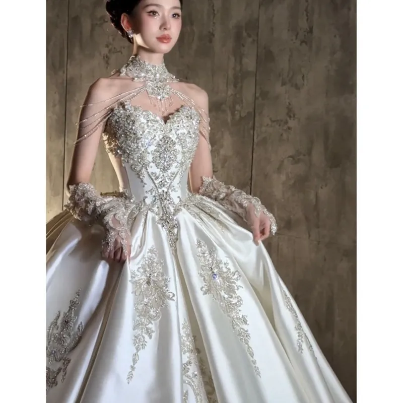 A new high-end custom-made satin strapless dress with luxurious