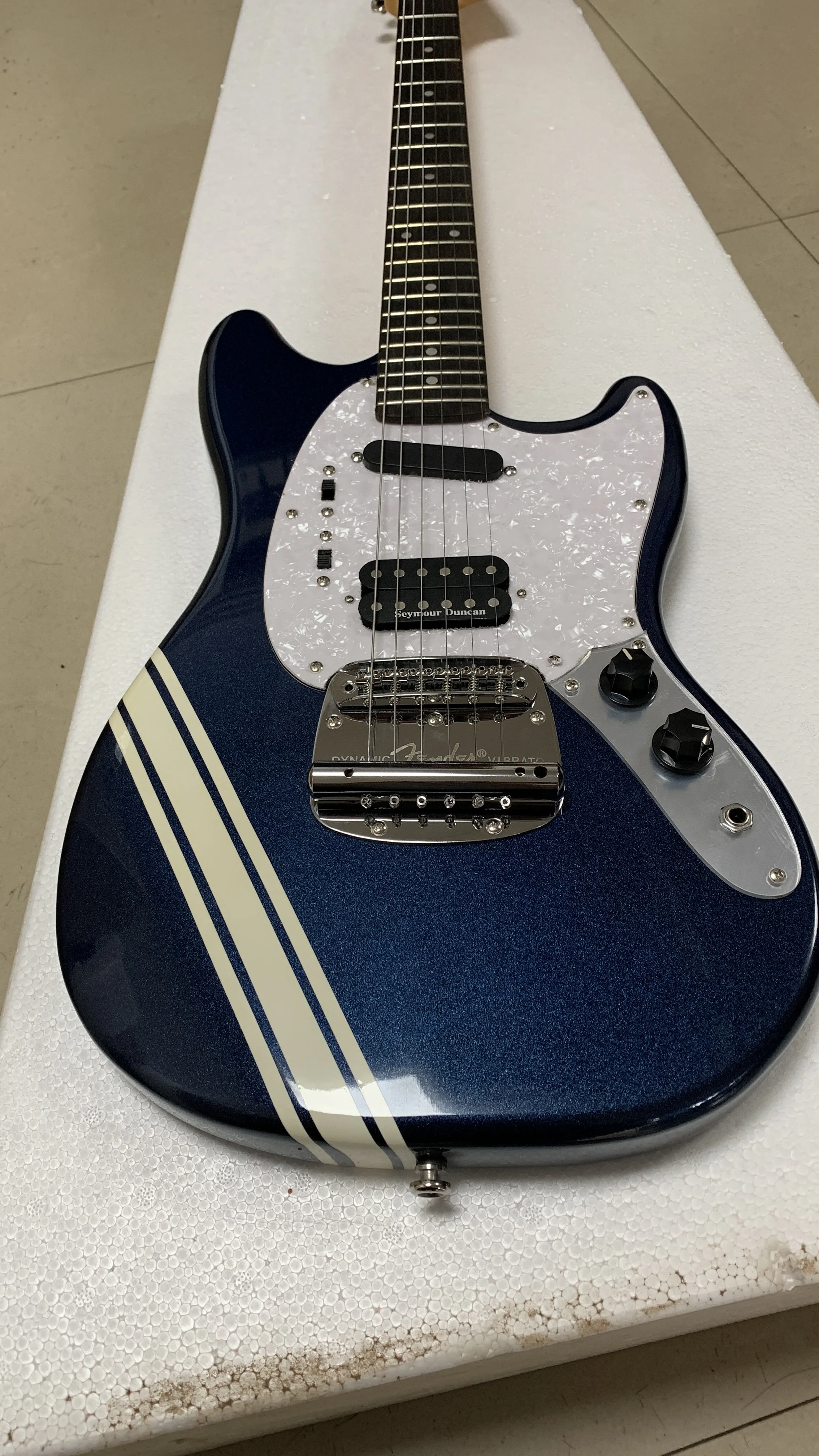 High-end custom 6-string electric guitar, metal blue body, special sticker design, support customization, free delivery