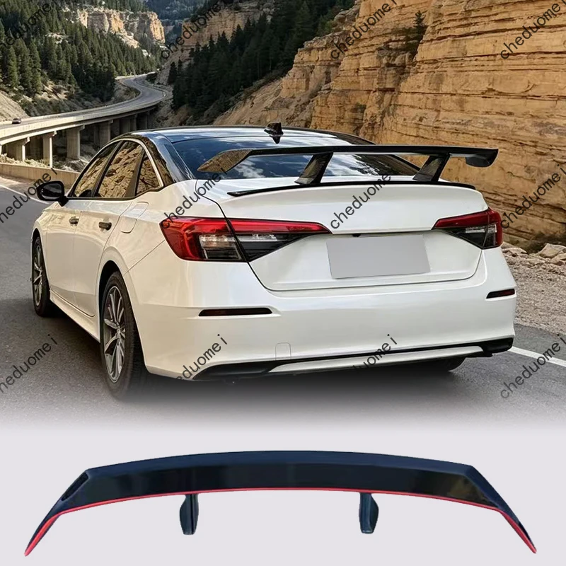 

For Honda's tenth generation Civic and eleventh generation sedan a universal true carbon brazed tail fin and rear trunk spoiler