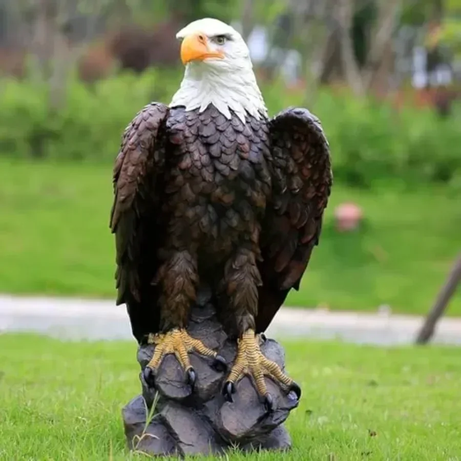 Outdoor lawn decor: hand-painted resin bald eagle statue in patriotic brown and white, 13 H x 24.4 L, weather-resistant for gar