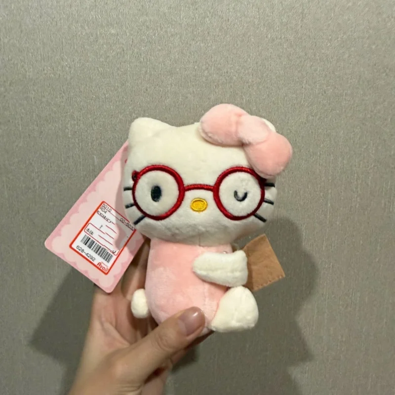 Sanrio Hello Kitty Red Framed Glasses Sitting Posture Read Books Modeling Plush Keychain Backpack Decorations Car Key Pendant