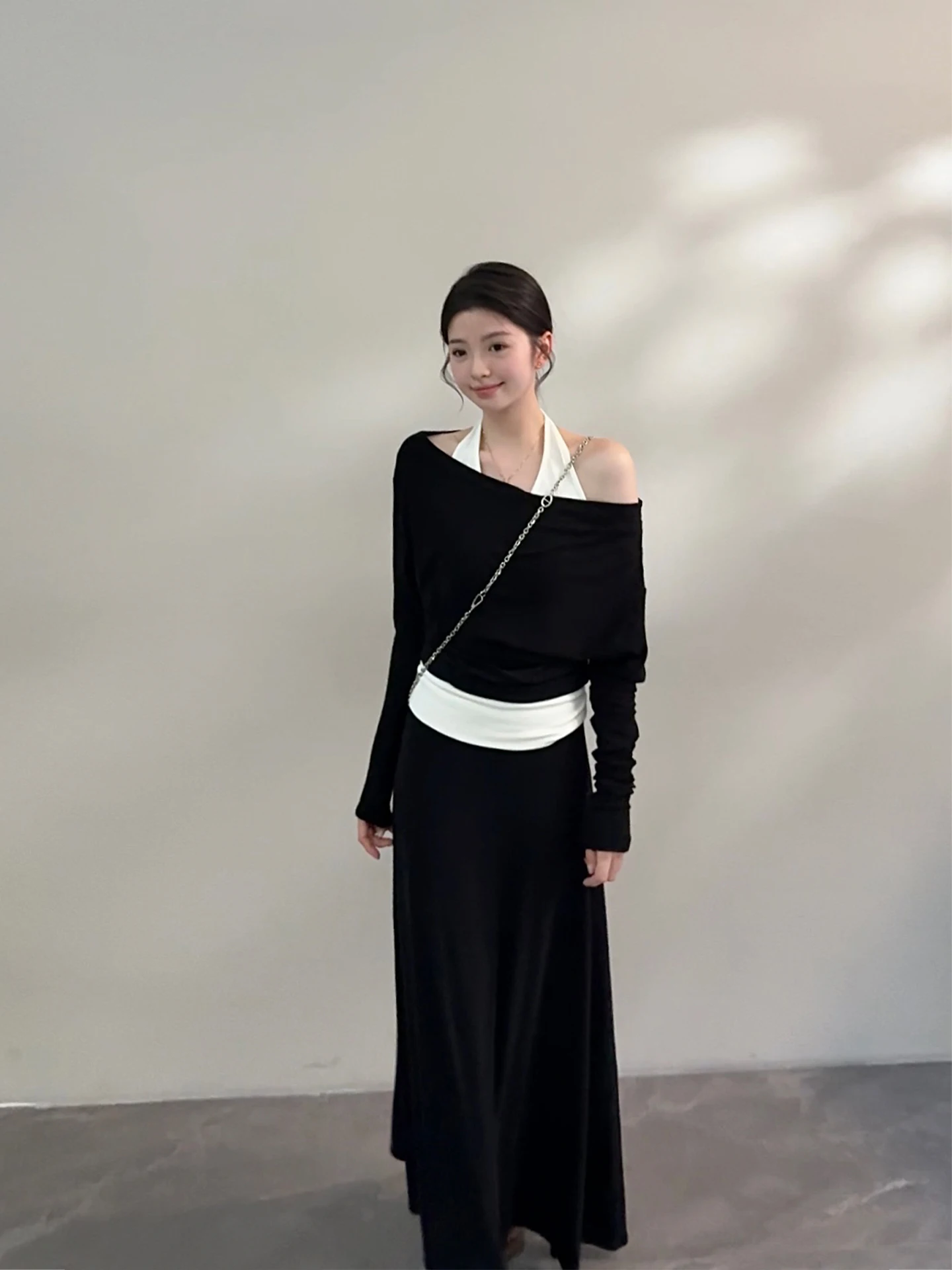 

Новинка! Модный женский комплект из двух предметов: повседневная юбка и топ на одно плечо с эффектом двухслойности Song Song Autumn DT53