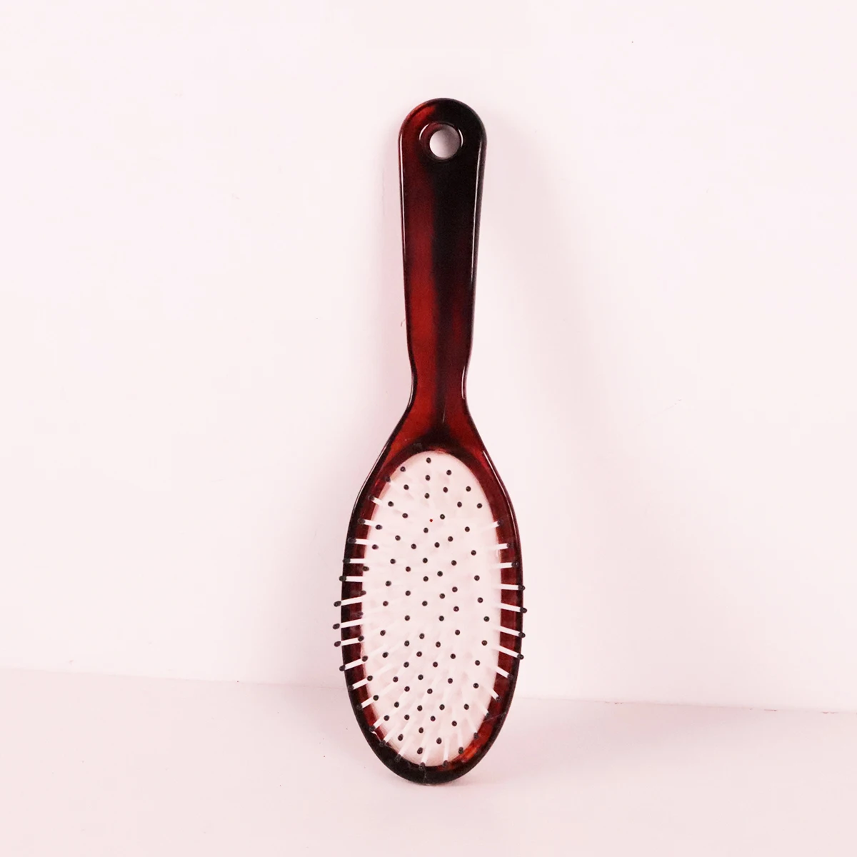 

1 piece of amber hair styling air cushion comb, anti-static, suitable for hairdressing families,special for real hair wigs