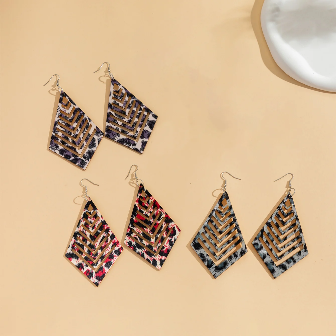 

3 pairs of wooden painted large earrings