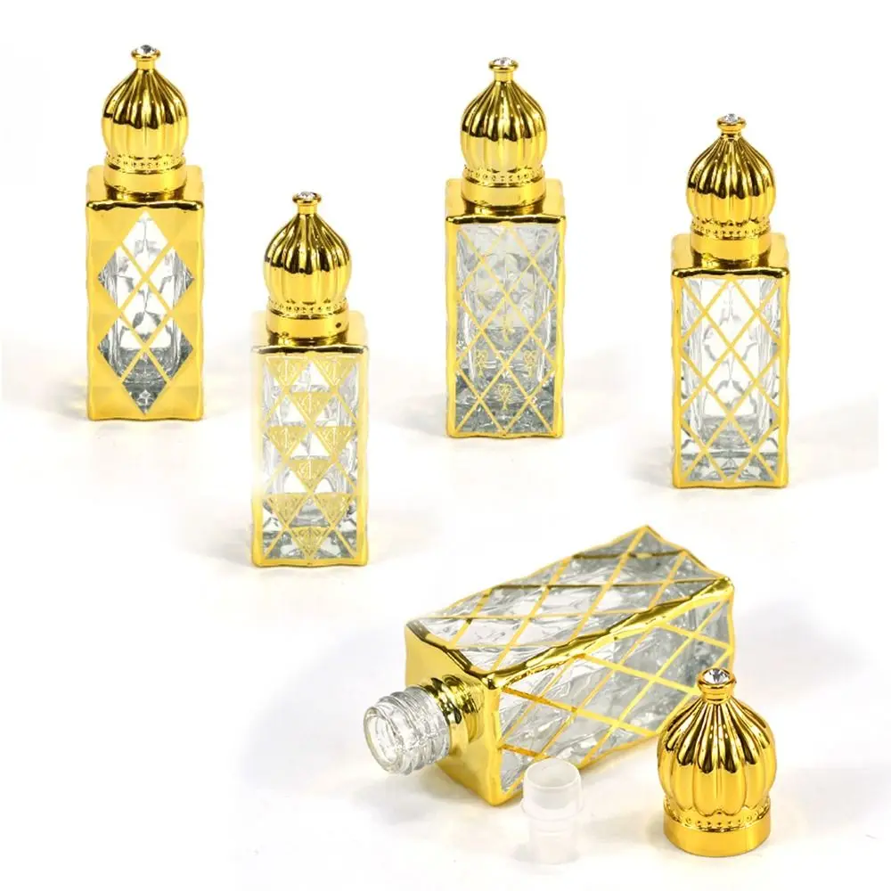 

Portable Luxury Perfume Bottles Empty 12ml Essential Oil Bottles Transparent Mini Gold Square Roll-on Bottle Cosmetic Container