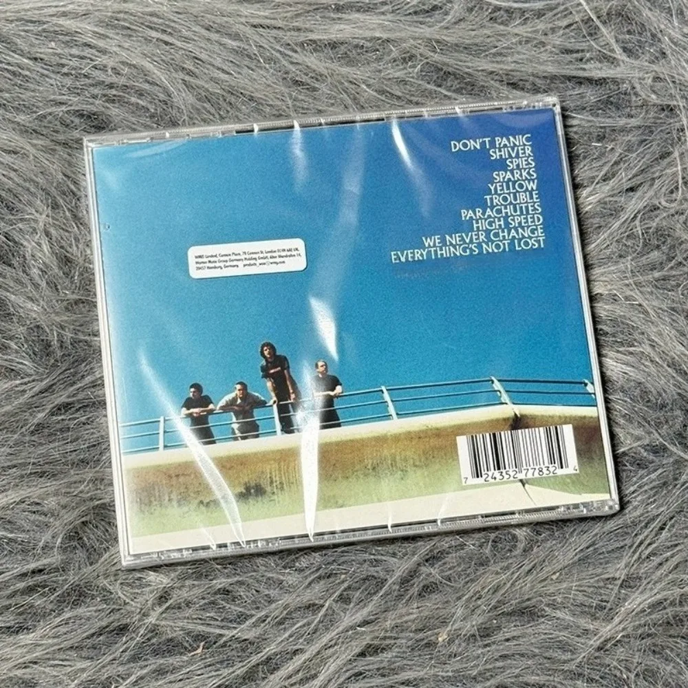 قرص مضغوط من Coldplay Parashutes النسخة الأوروبية - ألبوم Indie Rock الخالدة مع غناء لطيف للمعجبين والمجموعة