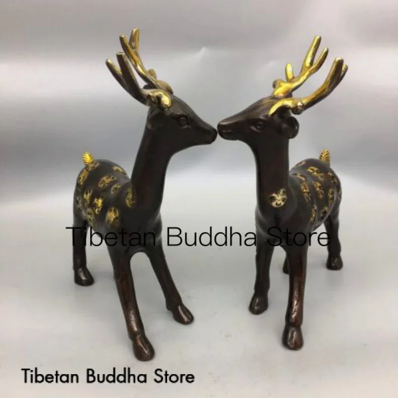 

Collection of antique bronze artifacts, a pair of sika deer