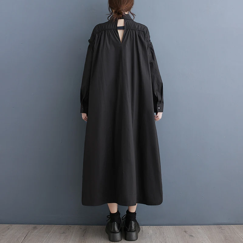 فستان ربيعي جديد بتصميم فضفاض وظهر مفتوح بلون واحد يخفي الجسم ويدبّر القوام بطول متوسط من القطن والبوليستر بتصميم A-Line