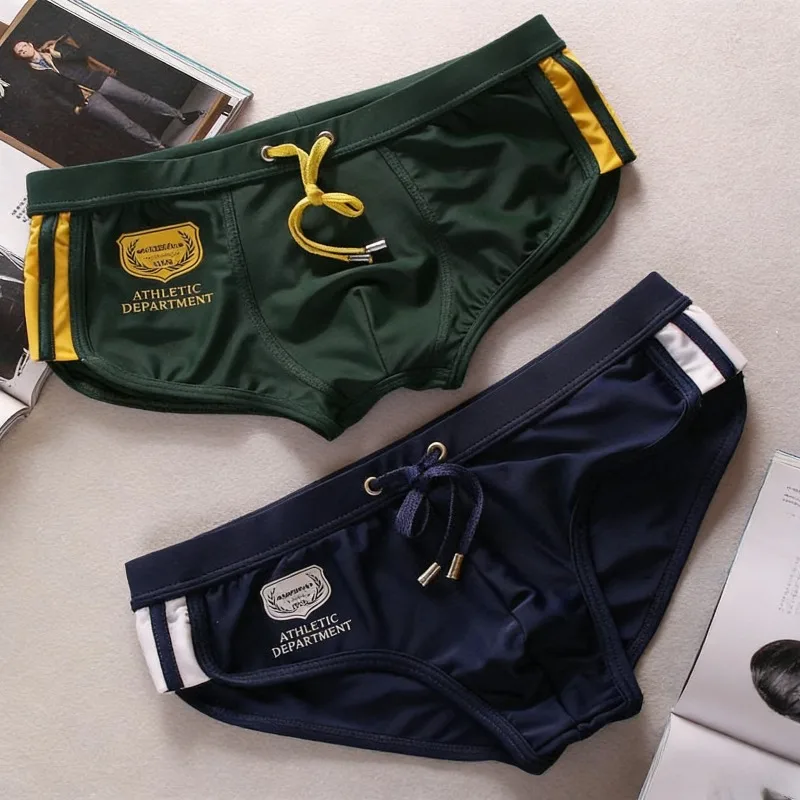 

Реальные фото различных моделей мужских классических качественных однотонных пляжных плавок 30806