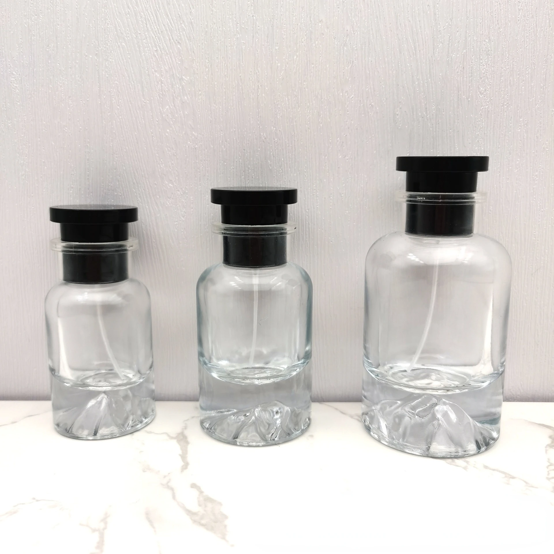 

30/50/100ML Round Cap Premium Perfume Separate Bottle Fine Mist Spray Bottle Large Capacity Pressed Perfume Refillable Bottles