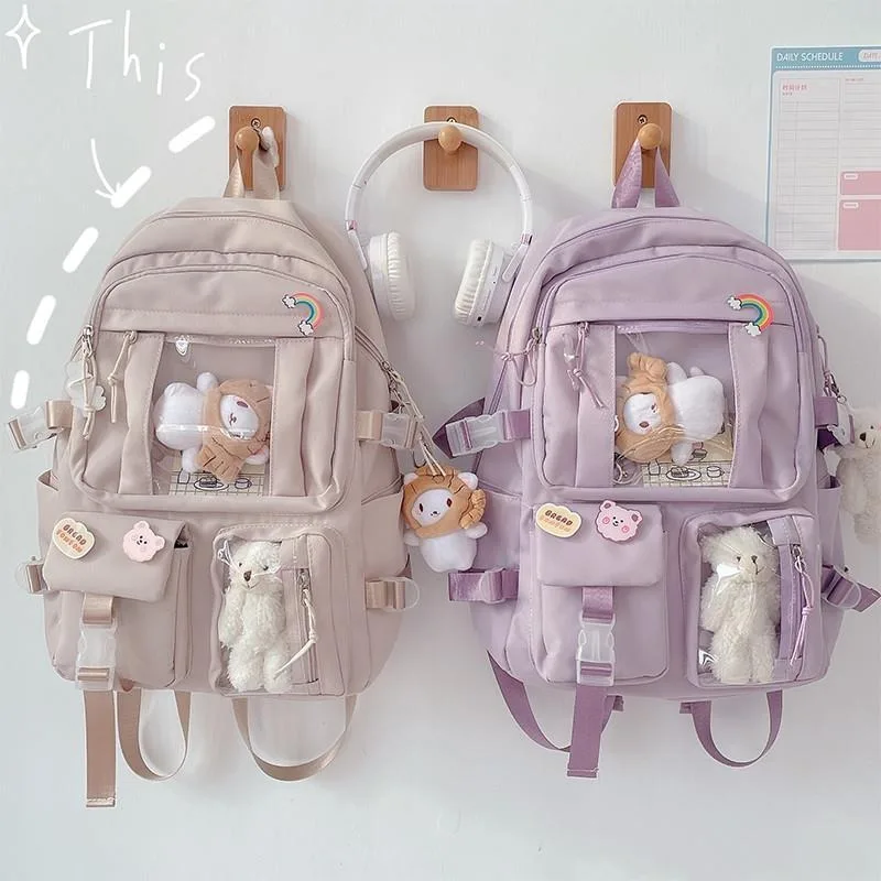 Mochila escolar de nailon con todo colgante para niña, bolso impermeable con bolsillo para estudiante, mochila Kawaii para mujer, paquete de libros para ordenador portátil