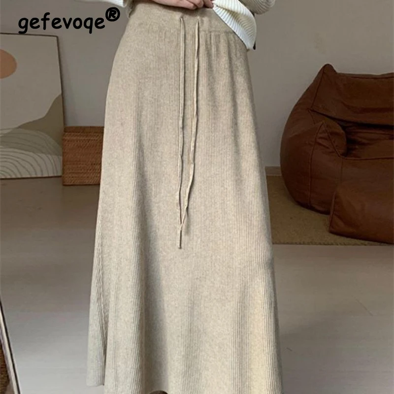 

Женская одежда Корейская мода Простые шикарные вязаные длинные юбки на шнуровке Осень-зима Элегантная однотонная юбка трапециевидной формы с высокой талией Faldas