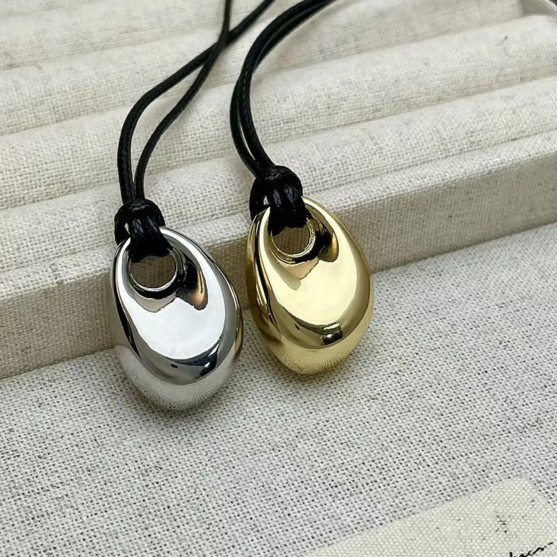Korean Black Skin Rope Silver Color Bean Pendant Necklace For Women Men Jewelry 2026 Trending New Vintage Couples Necklace Gifts