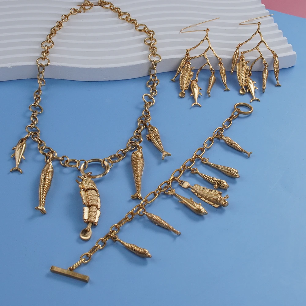 

Bohemian Fish Jewelry Set - Fashionable Travel Themed Necklace Bracelet Earrings with Various Pendant Fish Designs