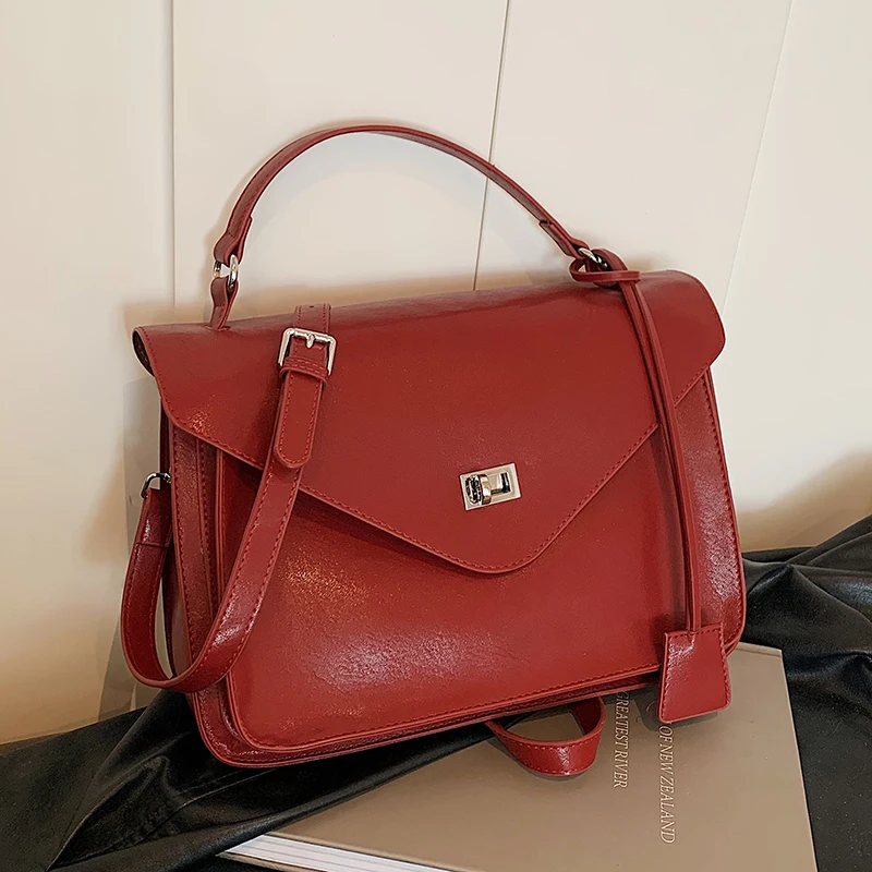 Bolso de hombro de cuero suave de lujo para mujer, bolso de mano de gran capacidad, bolso cruzado de viaje de moda Retro, bolso de cartero con cerradura elegante