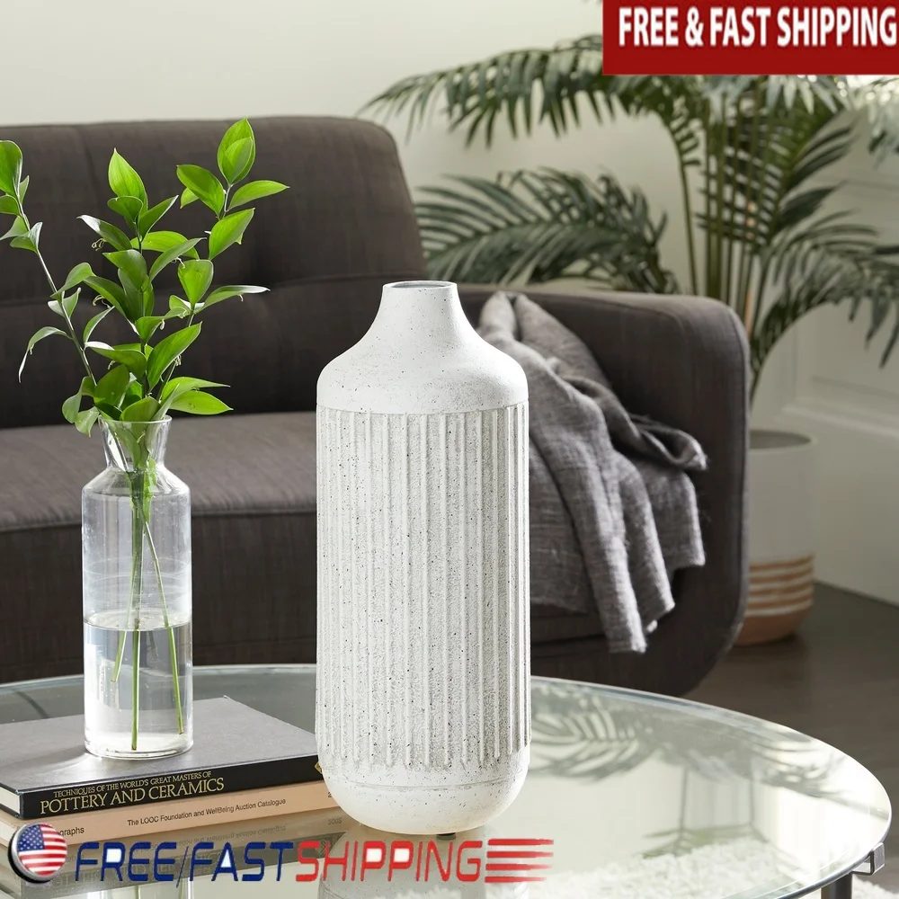 

Современная 17-дюймовая серая текстурированная железная цилиндрическая ваза со скульптурным акцентом и резиновыми пробками для внутреннего использования