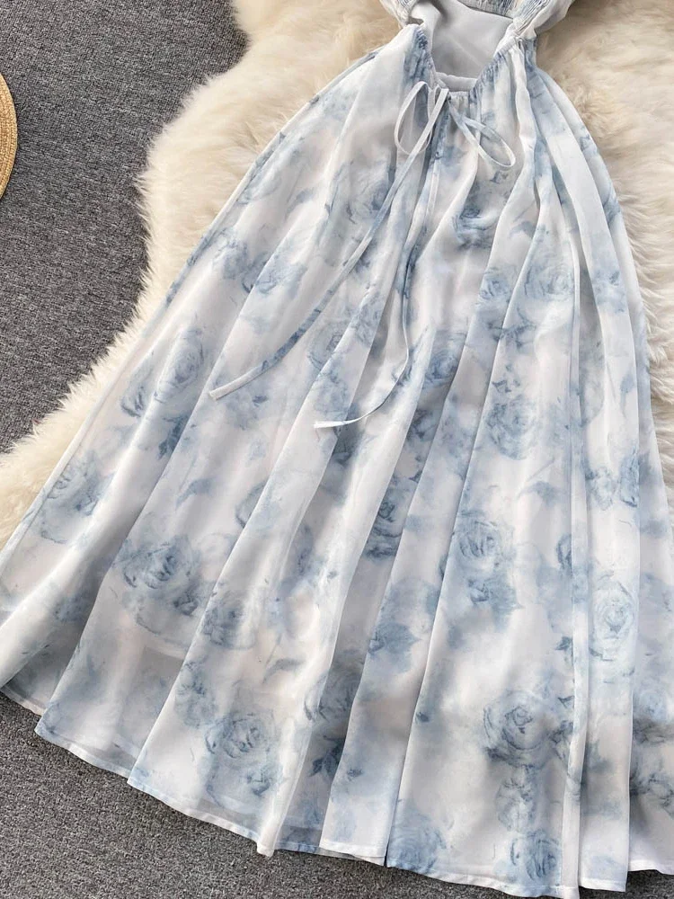 Abito lungo moda estiva donna stampa floreale Sexy Hollow Backless Strappy Party Dress femminile Boho Vacation Beach Outing prendisole