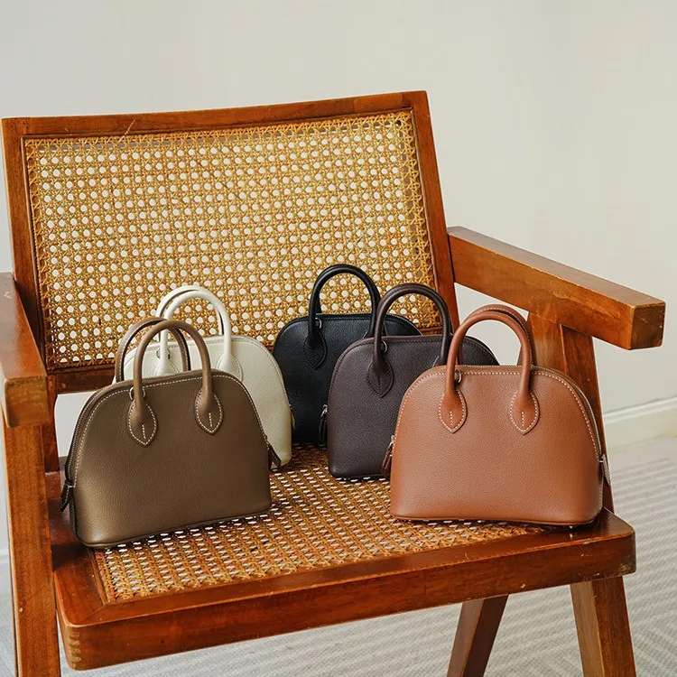 

Golf Ball 2024 ell Head Layer Cowhide Handbag Texture Versatile Genuine Leather Crossbody Bag for Women And Men