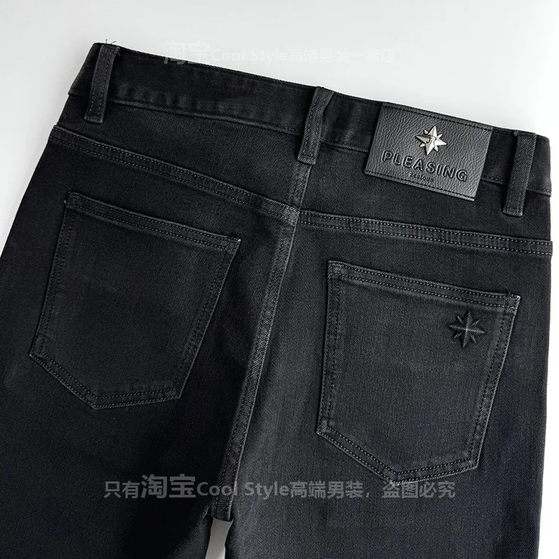 

Autumn high-end minimalist black jeans men's slim fit small feet light luxury fashion stretch denim 2026 new pants
