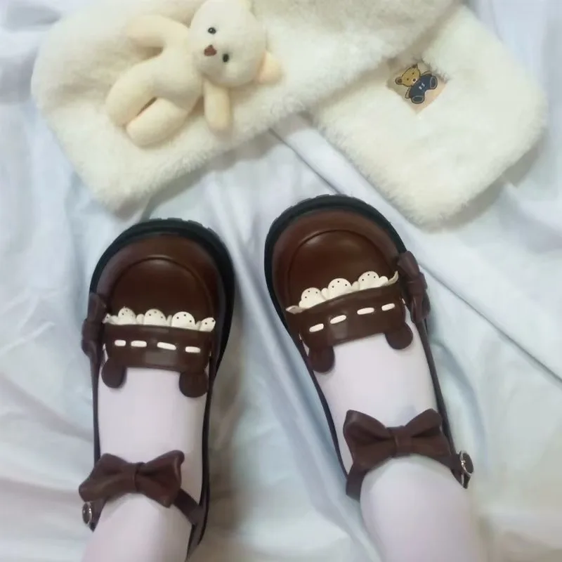 أحذية نسائية مسطحة ربيعية جديدة برأس مستدير وفم ضحل وعقدة على شكل فراشة ونعل سميك أحذية مانعة للانزلاق