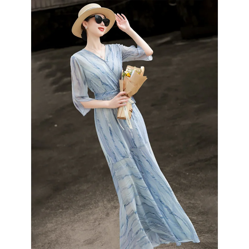

MEXCOCO 2026 Summer Tea Break Elegant Wrap V Neck Flared Sleeve Marble Print Tie Waist Tiered Ruffle Flowy Maxi Resort Dress