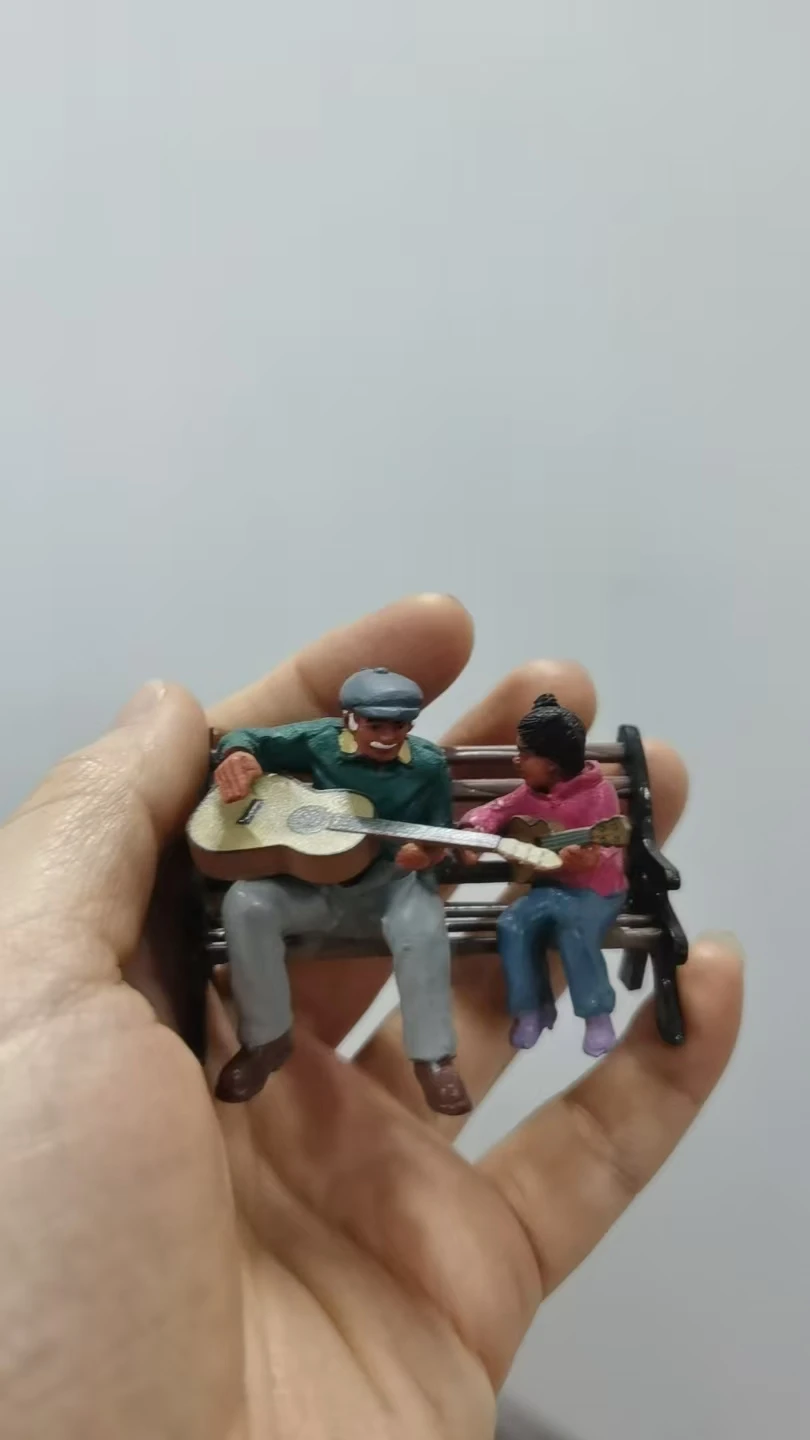 Resin figure mental psychological sand table game box court therapy  playing gitar on  chair