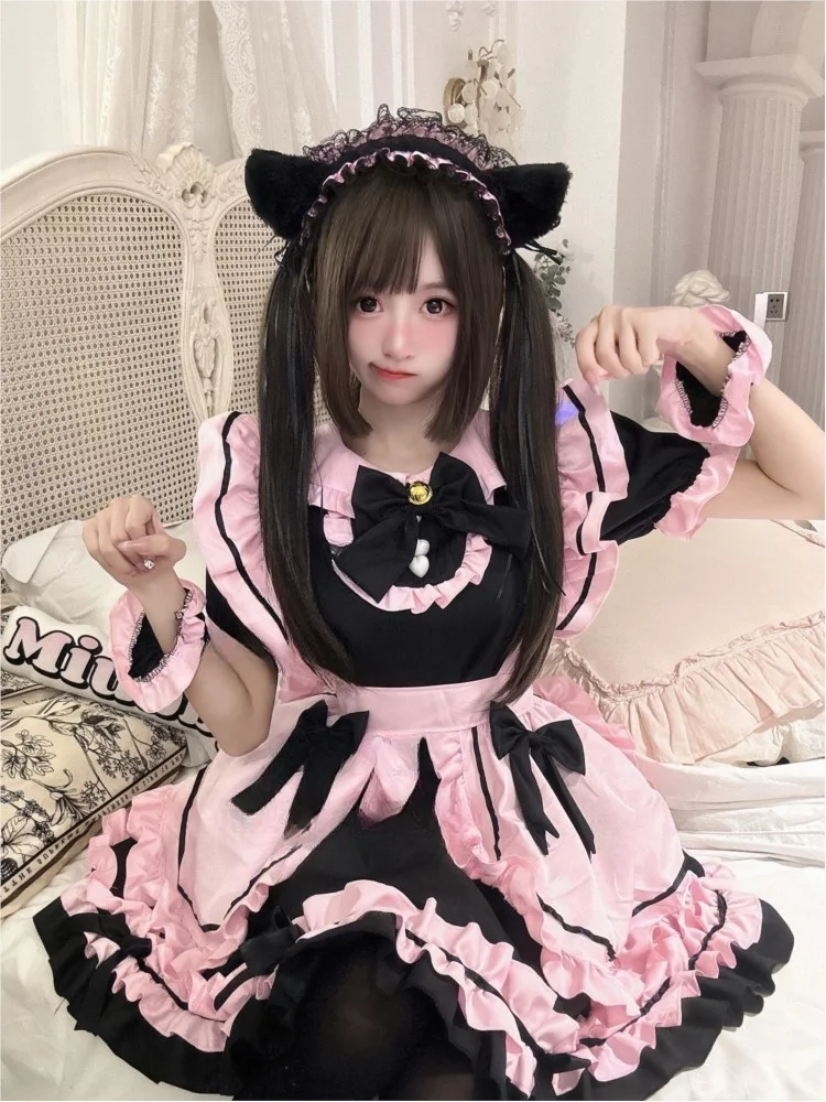 

Elegant and fashionable black and pink dress with bells