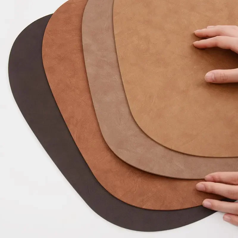 مجموعة من 4 مفارش أطباق من الجلد الصناعي غير منتظمة مقاومة للزيت ومقاومة للماء لطاولات المطبخ وطاولات البيسترو وطاولة الطعام