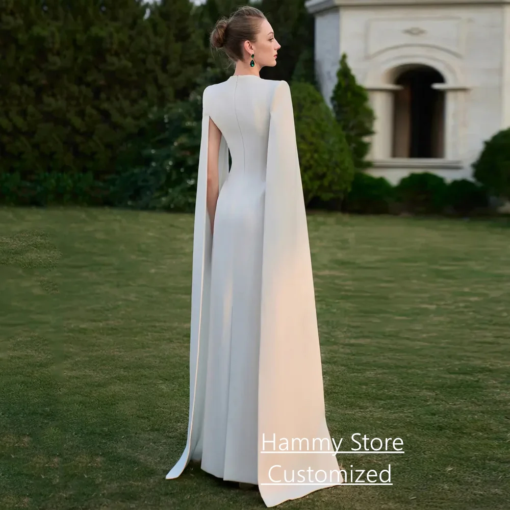 Suknia wieczorowa w kolorze kości słoniowej z Arabii Saudyjskiej, zdobiona koralikami i kamieniami, szyta na miarę, z dekoltem w kształcie serca, długimi rękawami, peleryną, prosta, formalna suknia balowa.