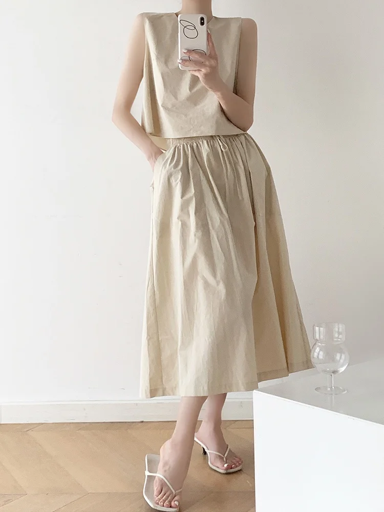 

Модный повседневный комплект из двух предметов: юбка-парасолька с завышенной талией и топом для женщин