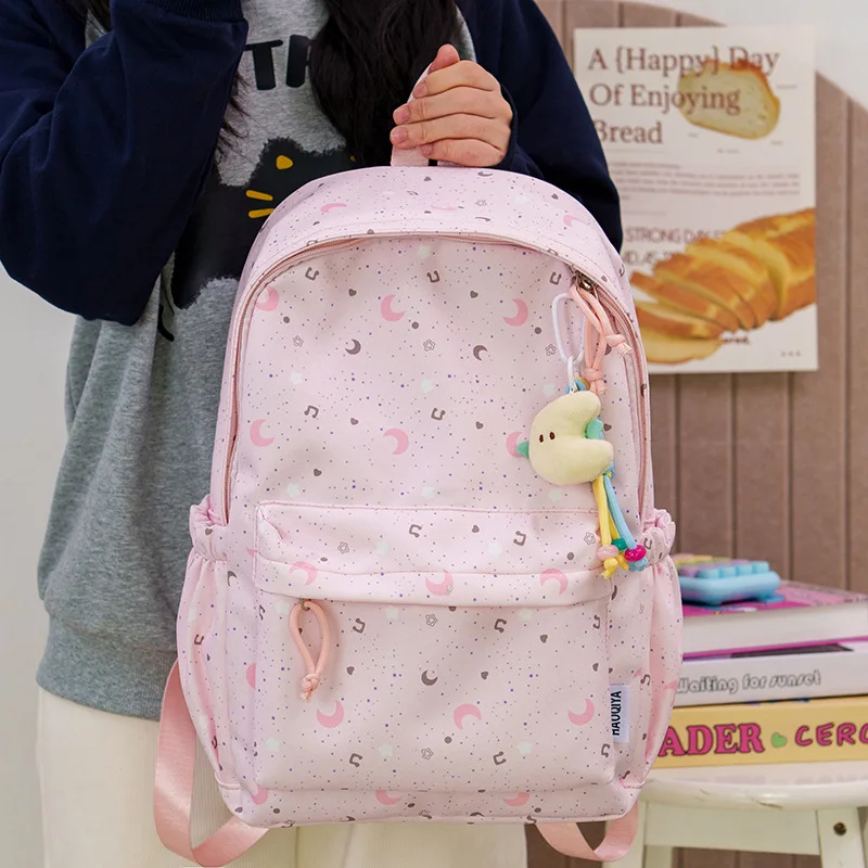 Large-capacity printed star and moon student schoolbag, breathable wide shoulder strap, cute girl travel backpack