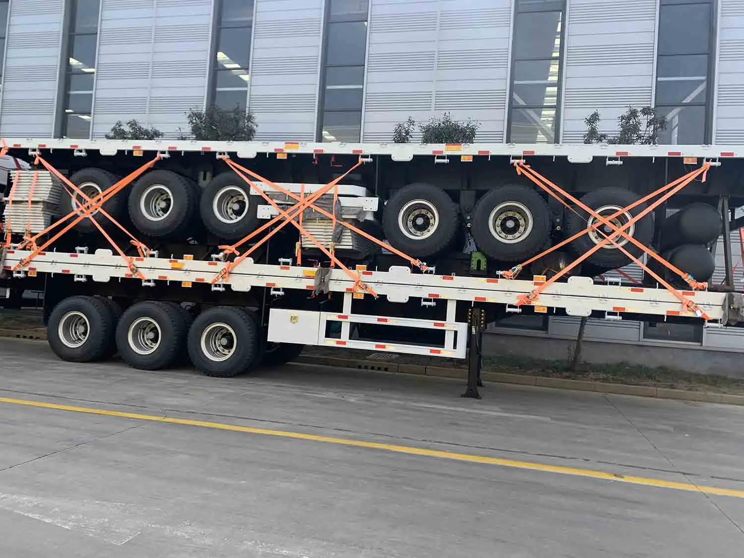 JKG Factory مخصص 40T أفضل بائع سرير مسطح شبه مقطورة 3 محاور للحاوية شبه مقطورة للحاوية #3