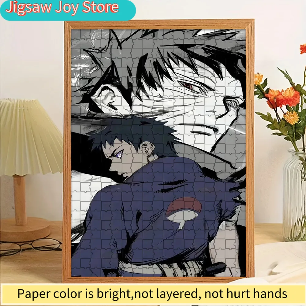 

Коллаж с персонажами аниме «Наруто»: Обито Учиха и эмблемой клана Учиха, бумажный пазл, премиум-качество, яркий принт высокой четкости, гладкая поверхность.