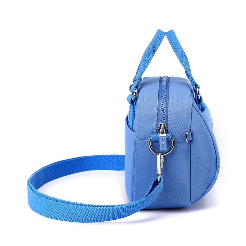 Ins Textured Women\'s Hand 2025 New Fashion Waterproof Oxford Cloth Fashion with Foreign Crossbody Shoulder SweetStyle Zipper Bag