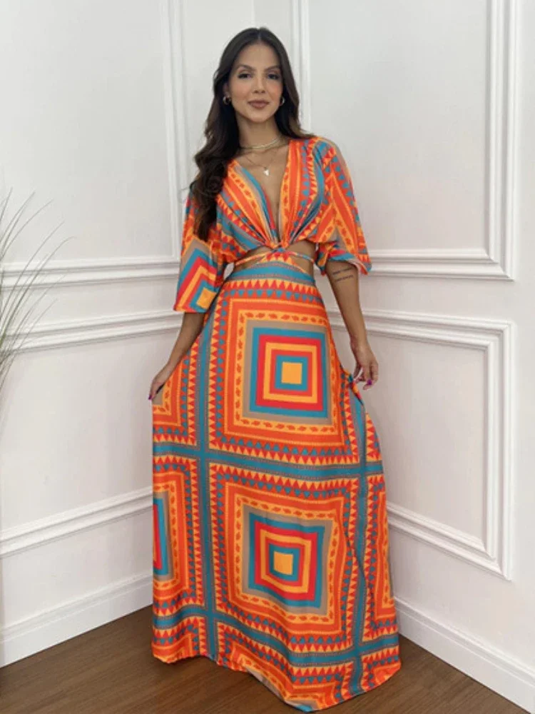 2025 Abito lungo elegante e sexy delle nuove donne di moda estiva 2025, scollo a V, temperamento stampato, abito lungo a mezza manica con blocco colore