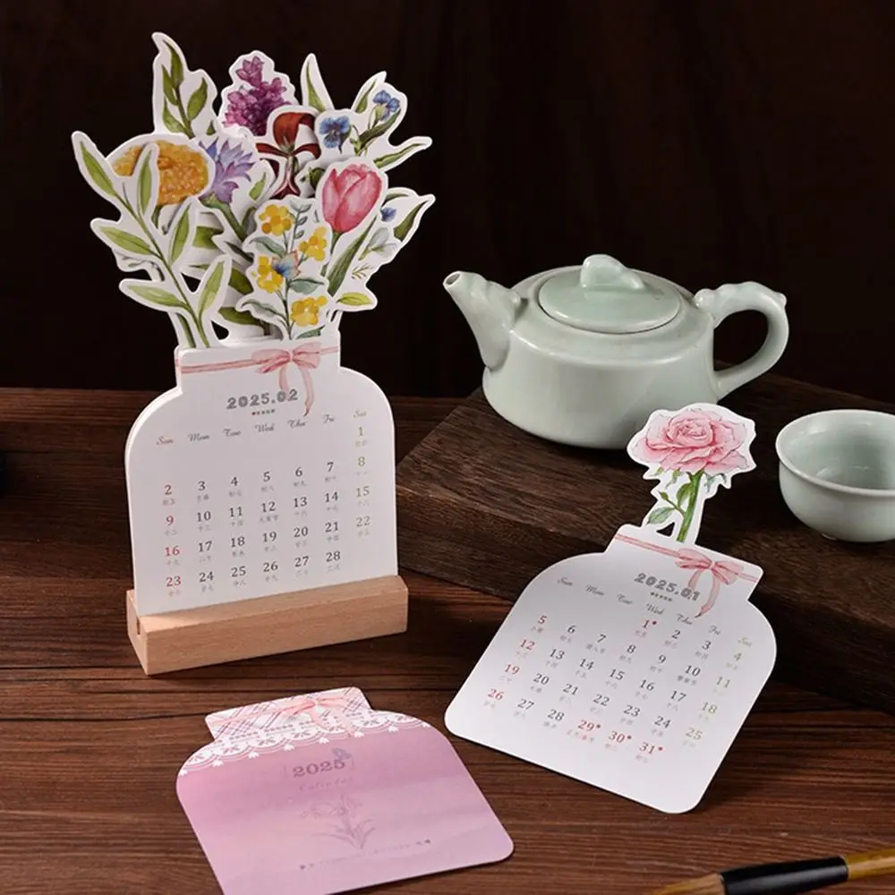 2025ดอกไม้บานปฏิทินตั้งโต๊ะปฏิทินปฏิทินจิ๋วโต๊ะพับได้เหมือนแจกันสมุดแพลนเนอร์รายเดือนสำหรับบ้านโรงเรียนสำนักงาน
