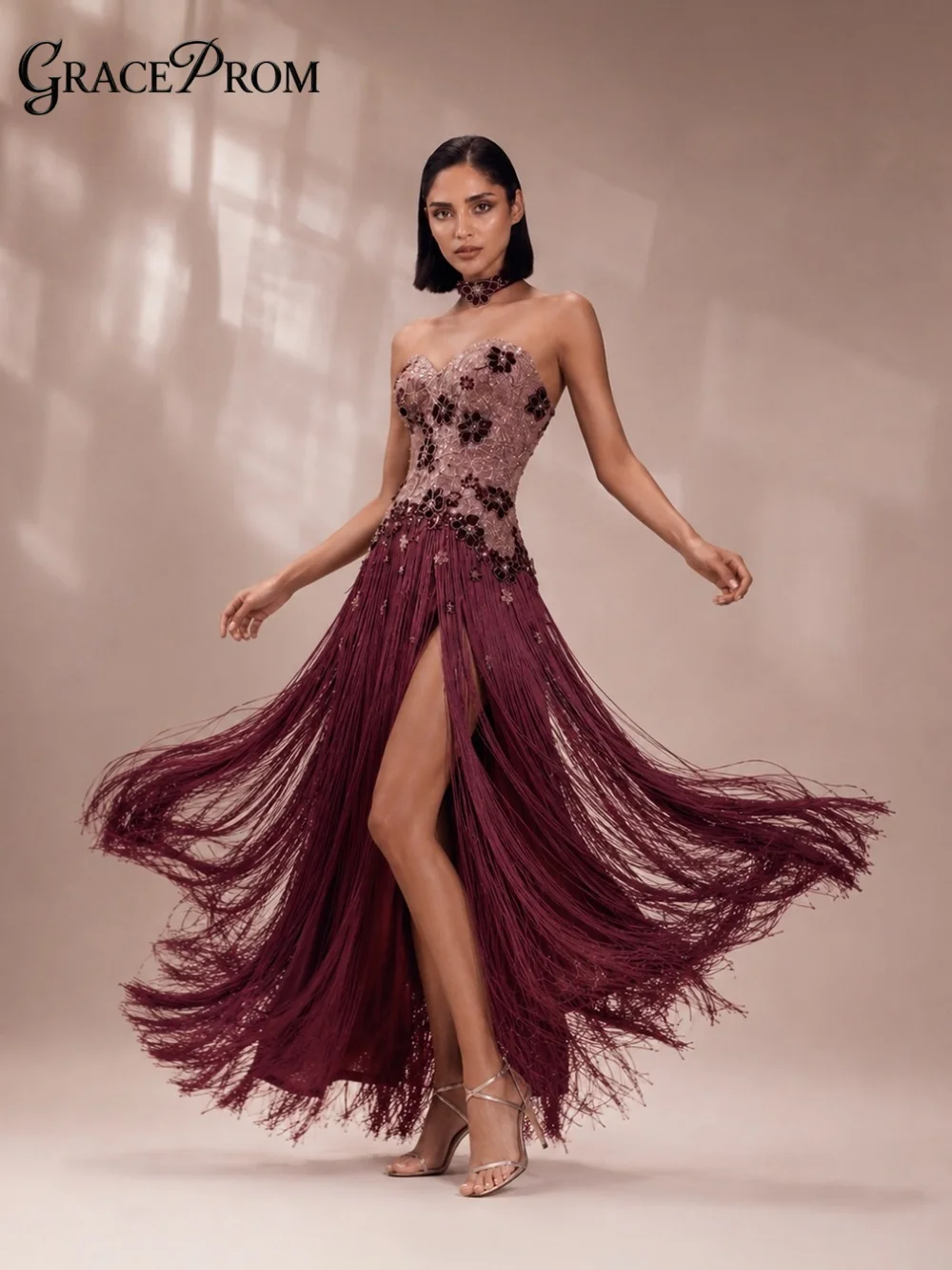 

Opulent Merlot Evening Gown 2026 Delicate Off Strapless Fit And Flare Formal Dress For Banquet Swing Tassel Beading فساتين سهرة