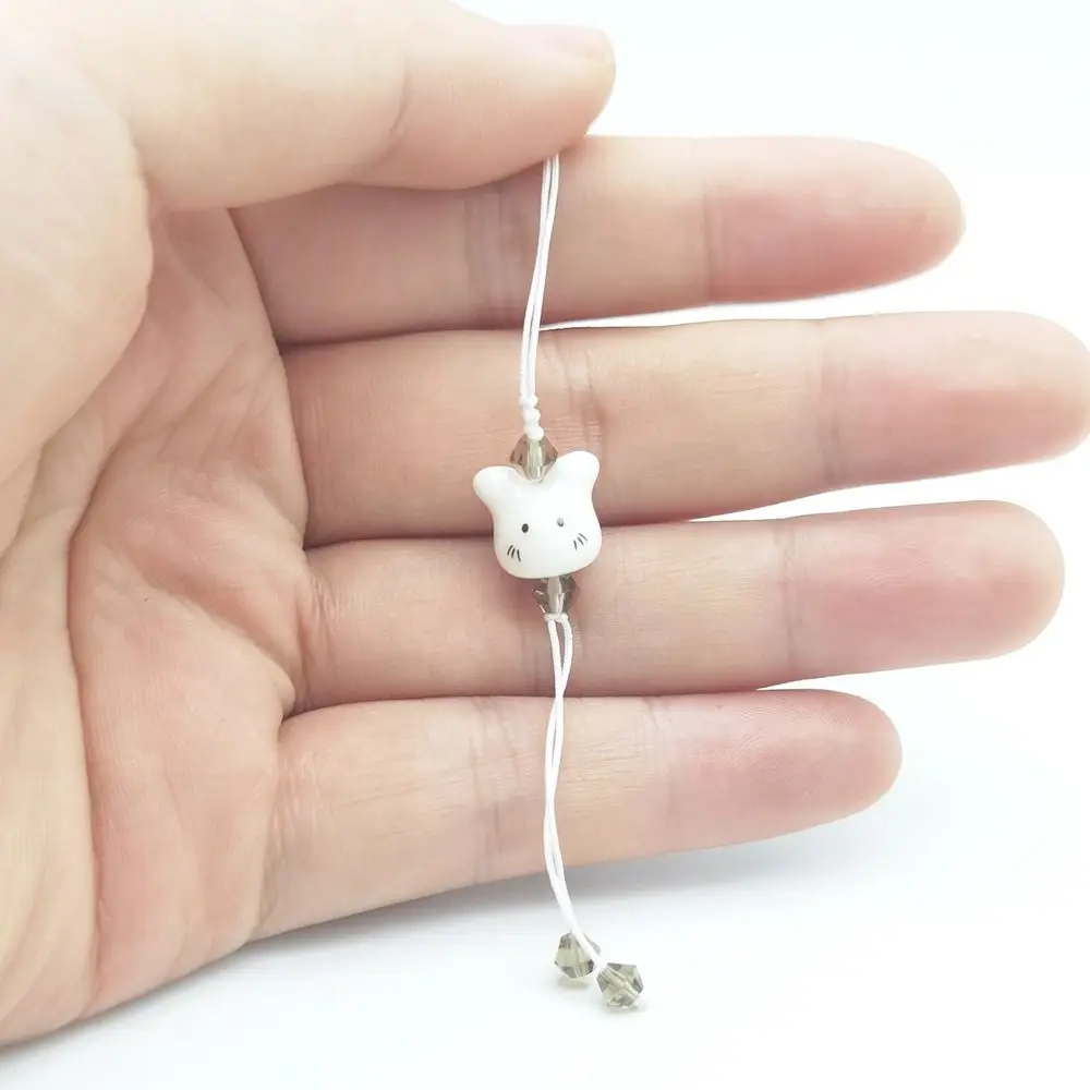 

Delicate Ceramic Bunny Pendant Rabbit Head Mobile Lanyard Phone Keychain Hanging Rope Beaded Phone Charm Strap Women Girls