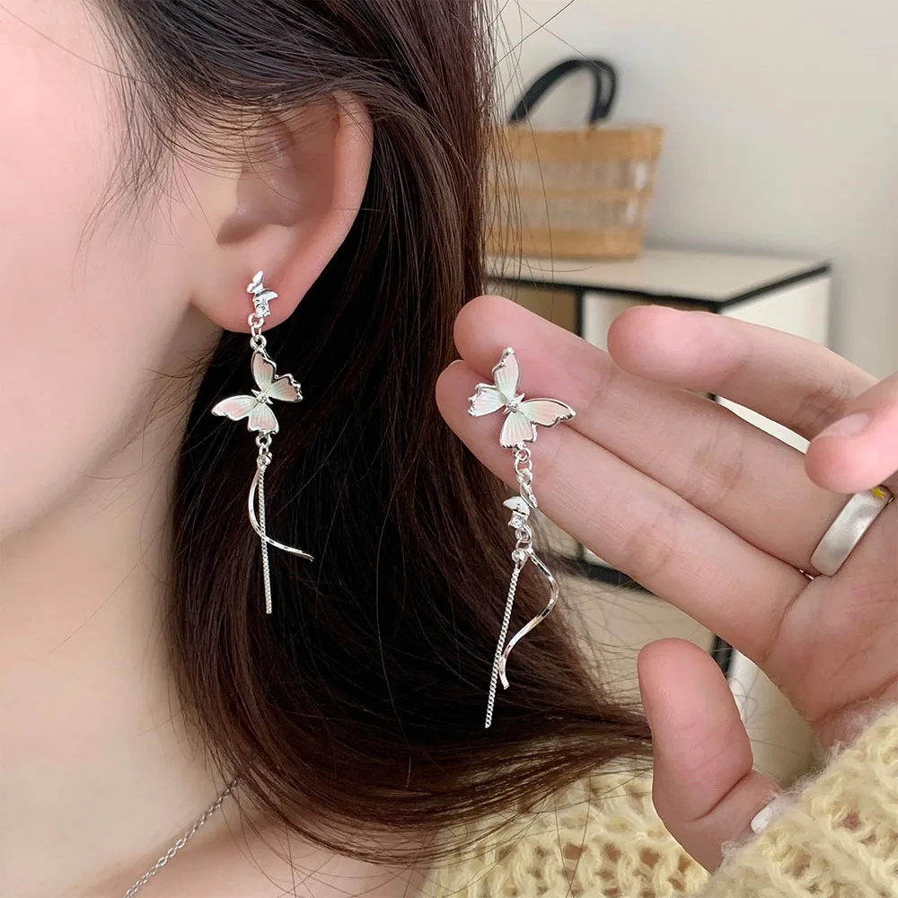 

2025 New Glaze Butterfly Charms Earrings for Women Silver Color Twist Metal S Shape Long Dangle Earrings Fashion Party Jewelry