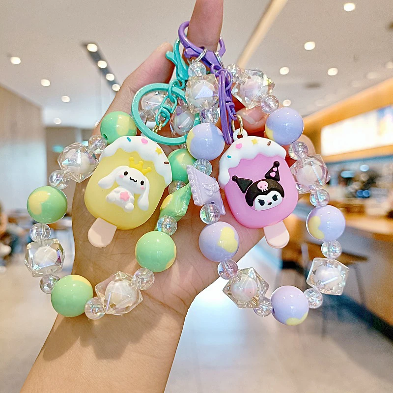 Sanrio Hello Kitty ซินนามอนม้วนลูกปัดสำหรับโทรศัพท์มือถือสายคล้องข้อมือแฟชั่นสั้นสำหรับป้องกันการสูญหาย