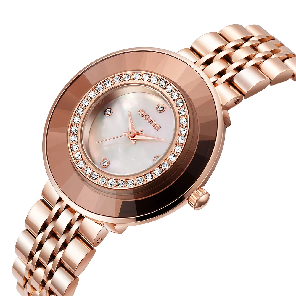 SKONE moda casual diamantes de imitación de cuarzo para mujer nicho simple estudiante moda tira de acero reloj de cuarzo para mujer